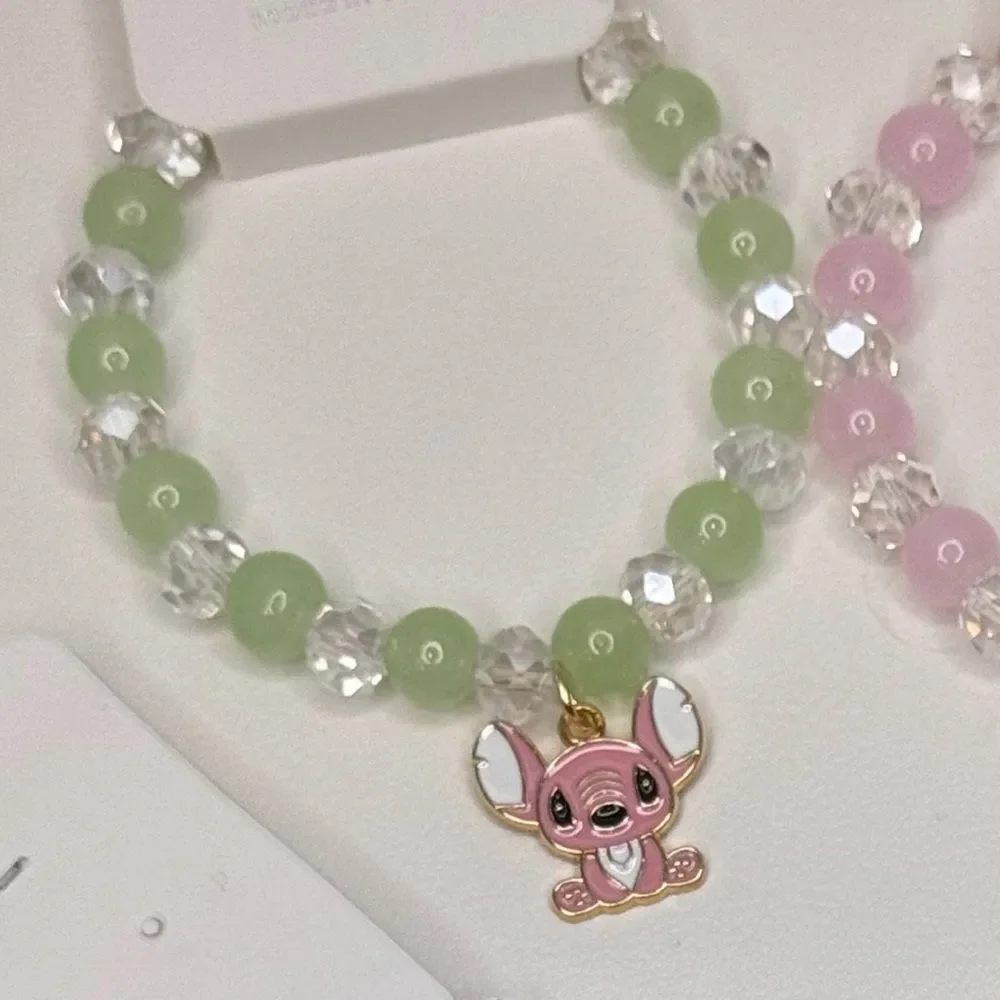 Colorful Kids Beaded Stretch Bracelet Purple beads green charm